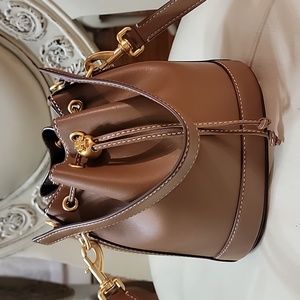 Lovingly used Tory Burch Leather Bucket Bag still feels brand new.
